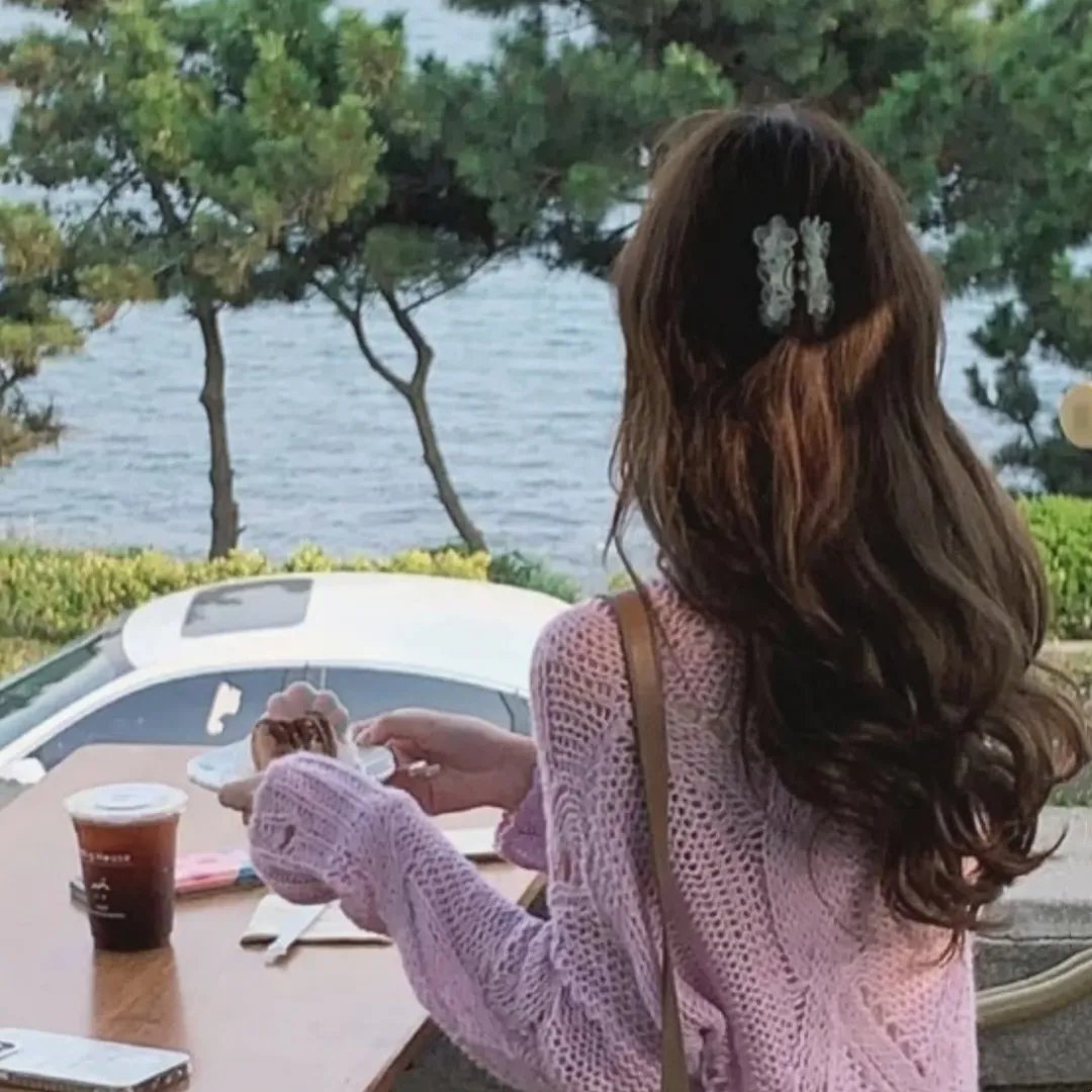 桃花含露又春风
